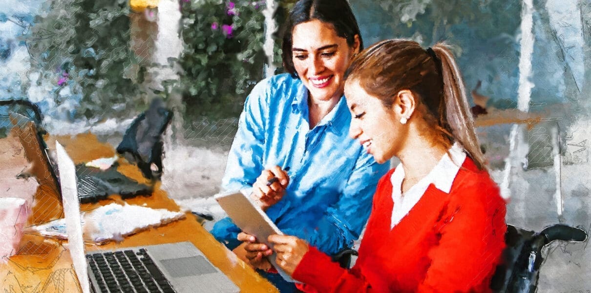 Young,Latin,Woman,In,Wheelchair,Working,With,Computer,At,Workplace